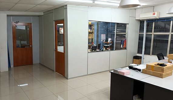 KK ECOMMERCE office with tiled floor and a packing desk